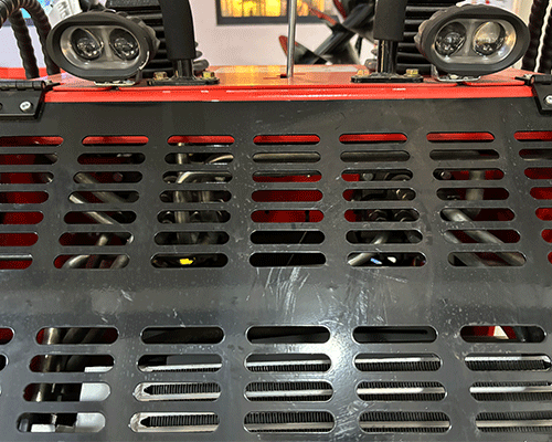 Kompakti liukuohjattu telaketju