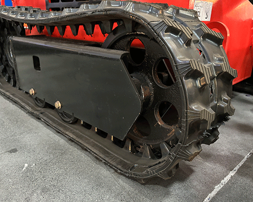 Kompakti liukuohjattu telaketju